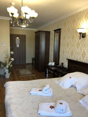 Фото номера Двухместный номер Делюкс с 1 кроватью Отель Oławian Hotel г. Олава 5